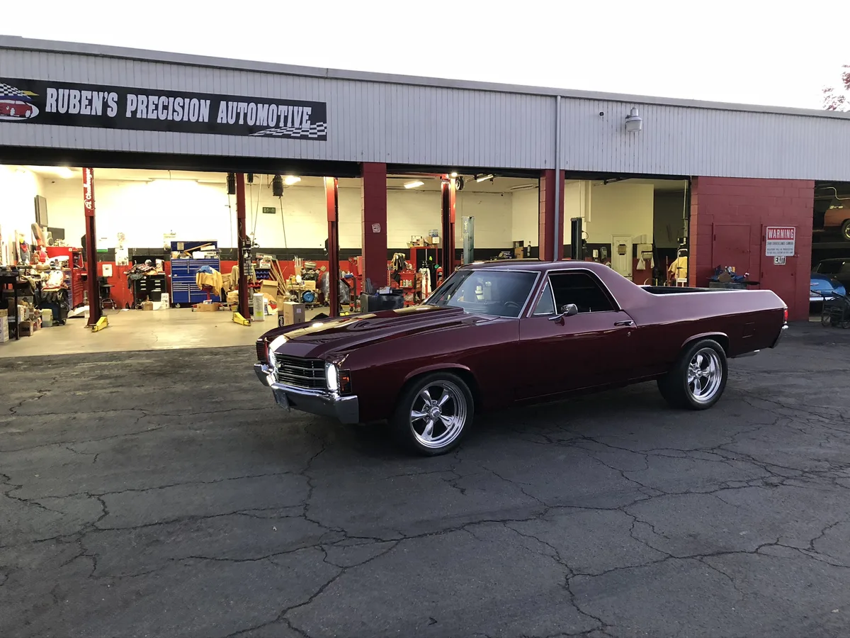 Dark maroon classic coupe with professional finish